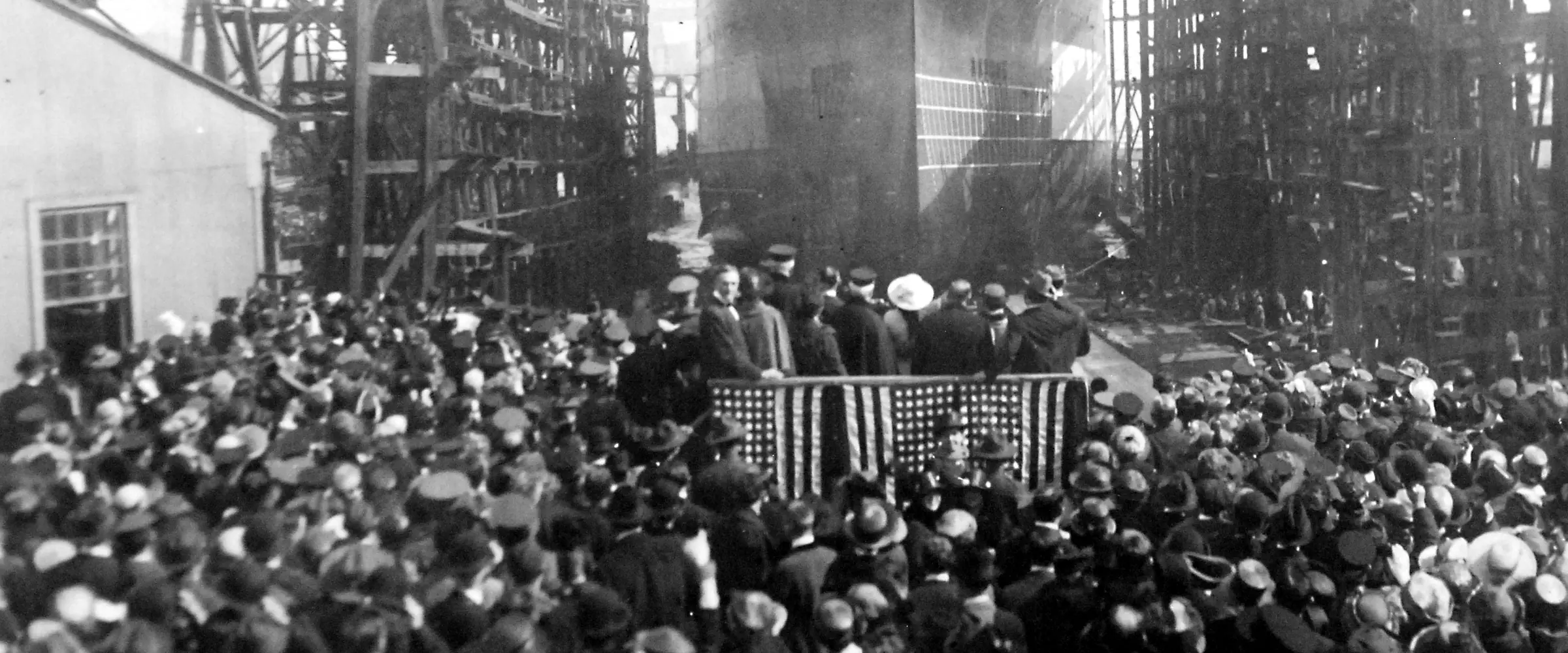 Crowds fill the shipyard as the battleship USS Tennessee is launched, 1919
